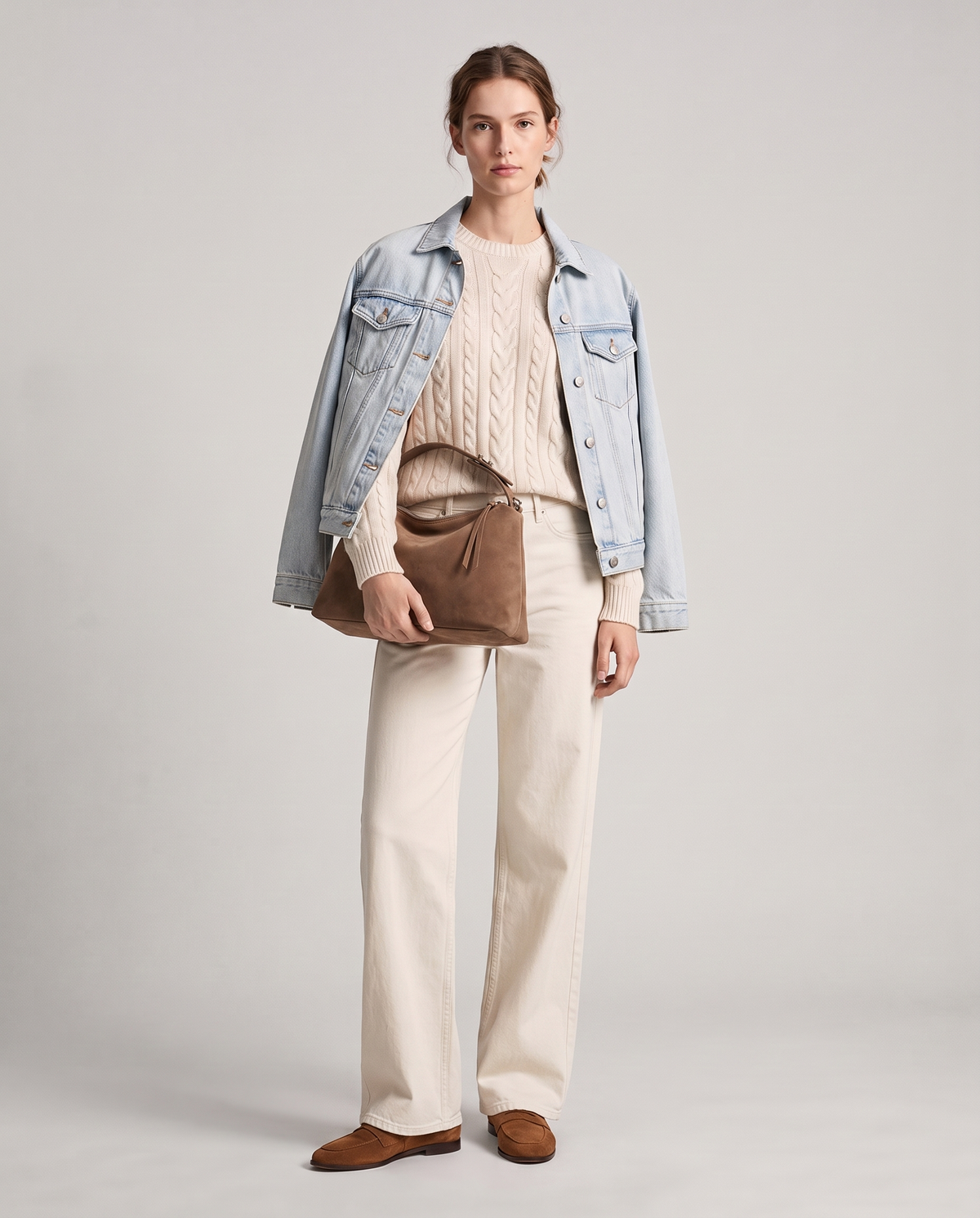 Model with the Cima suede shoulder bag in brown, full length