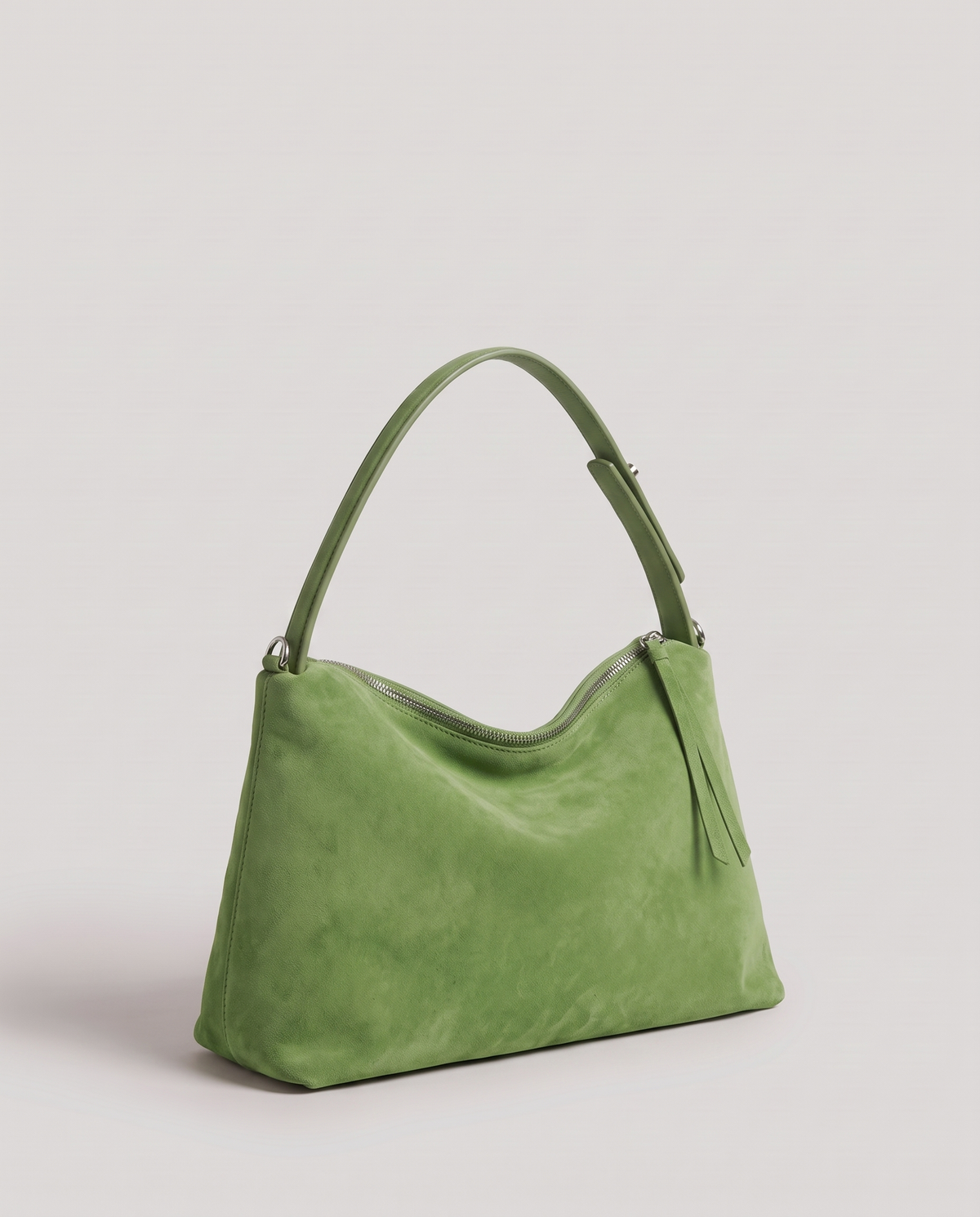 Cima suede shoulder bag in green, three-quarter view