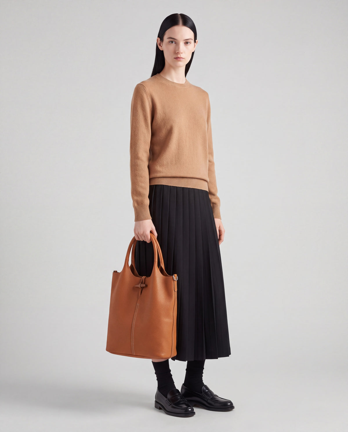 Commute bag in Caramel – worn by model, full length