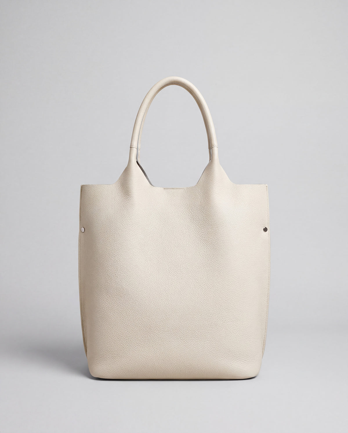 Commute bag in Cream – back view
