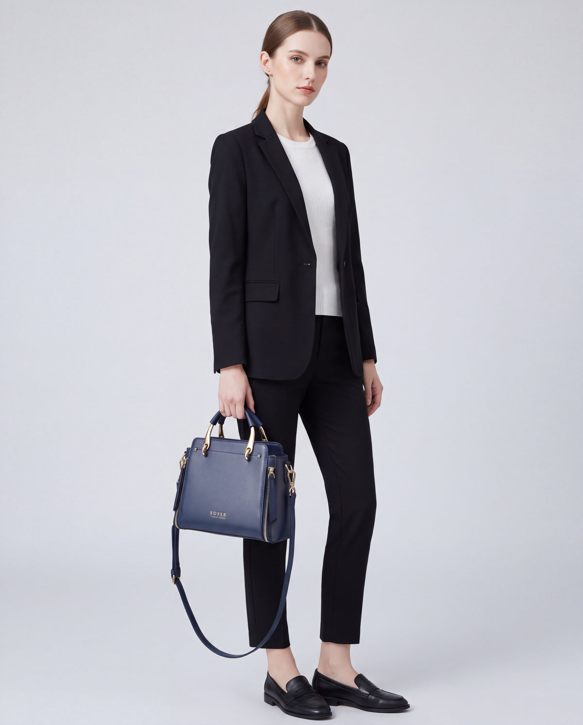 Contrast bag in Blue – worn by model, full length