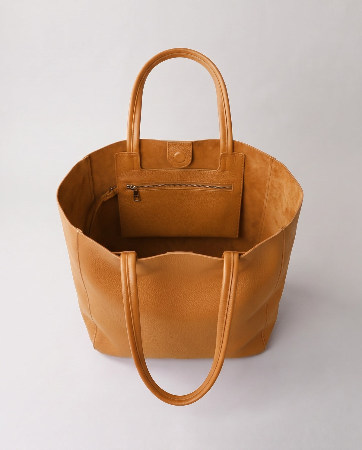 Costa leather tote in camel, open showing interior