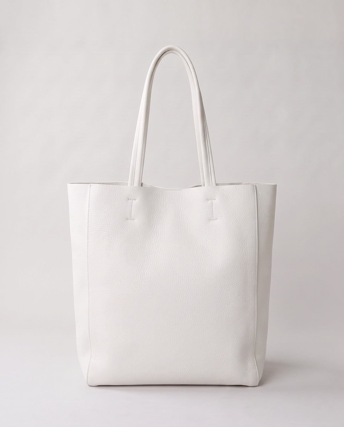 Costa leather tote in chalk, back view
