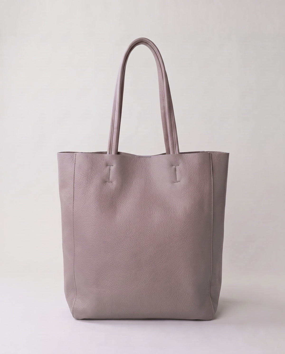 Costa leather tote in grey, back view