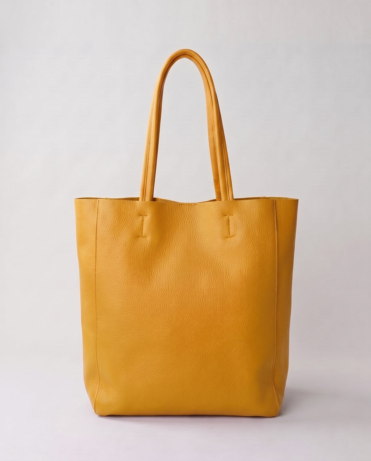 Costa leather tote in mustard, back view