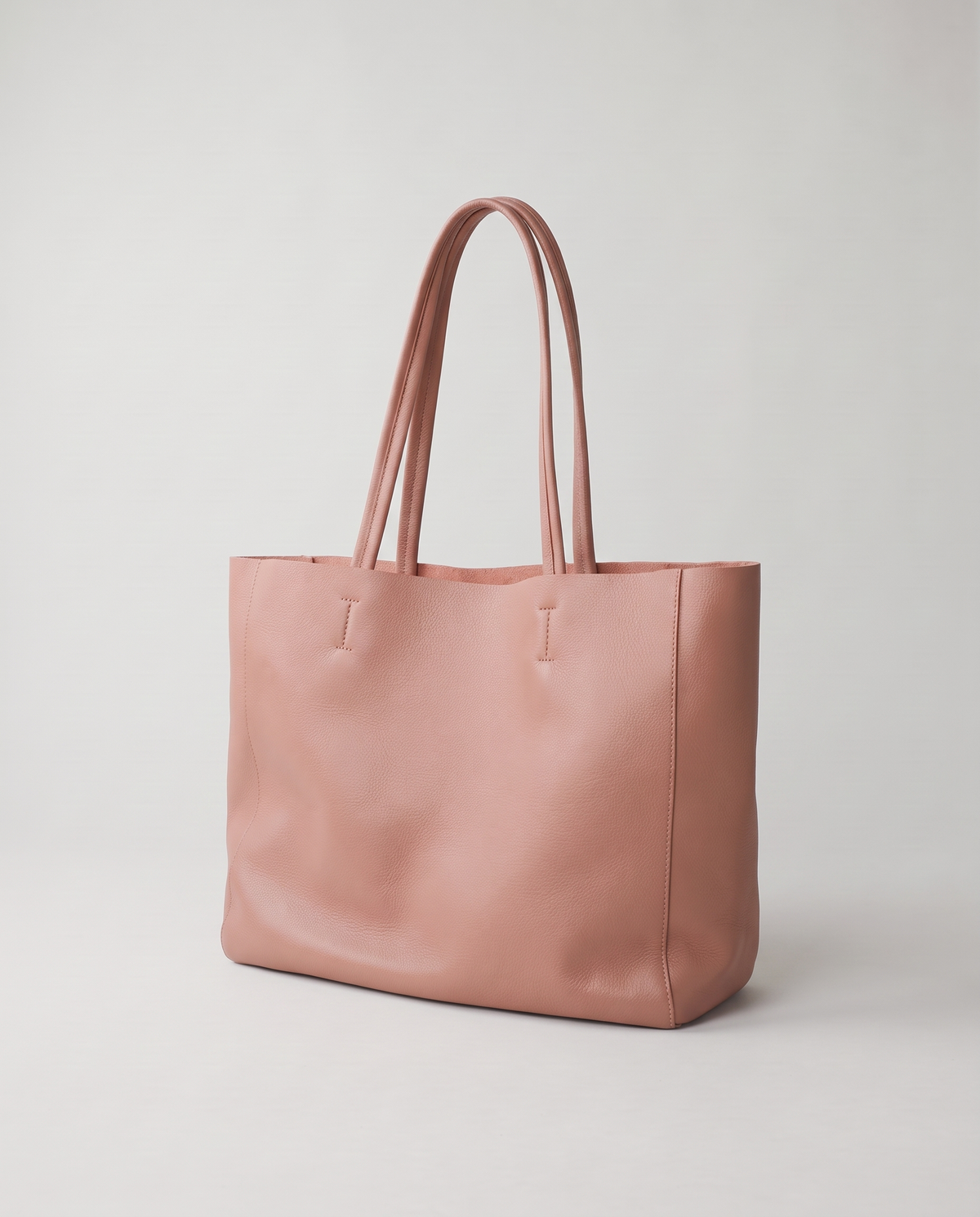 Costa leather tote in rose, three-quarter view