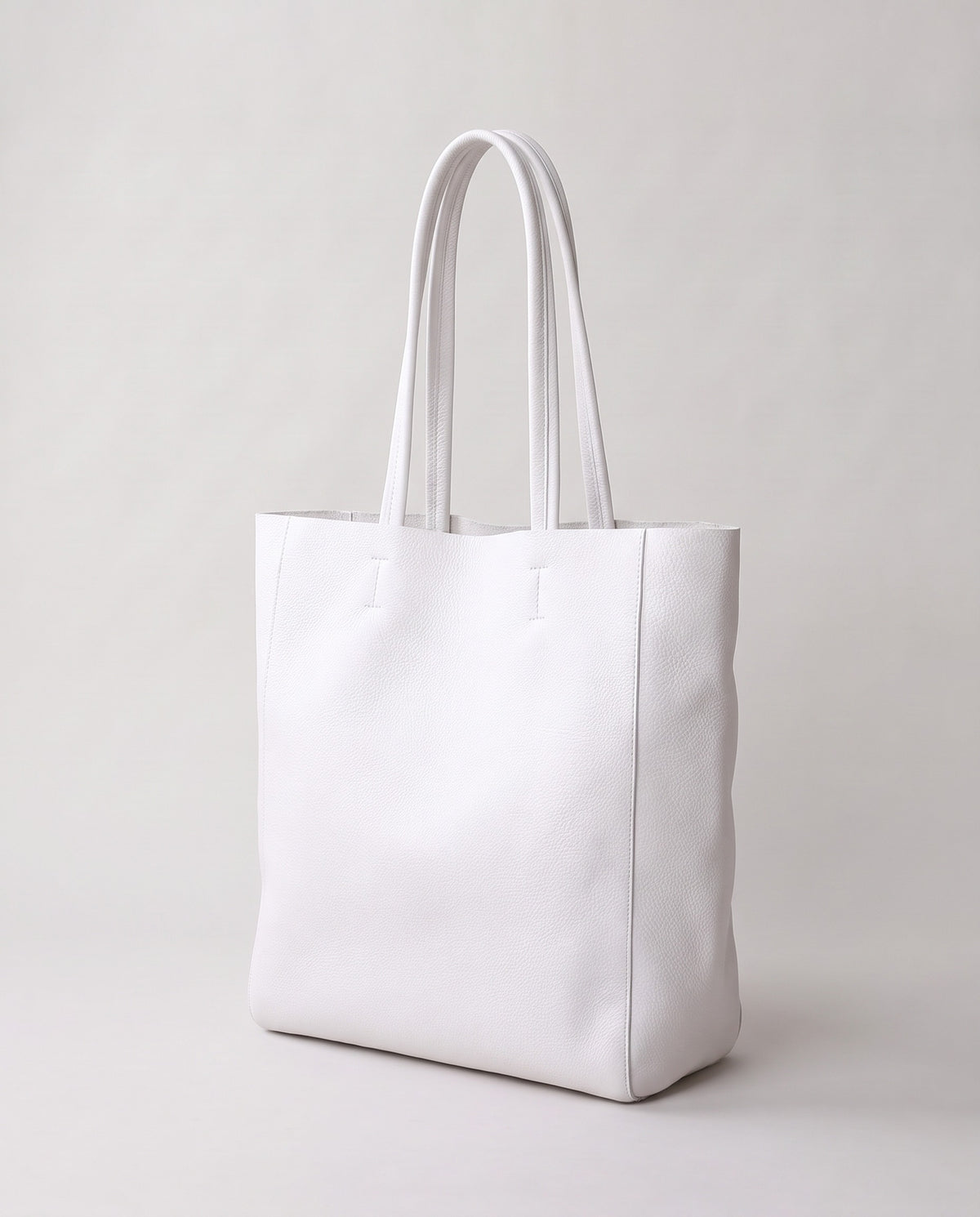 Costa leather tote in white, three-quarter view