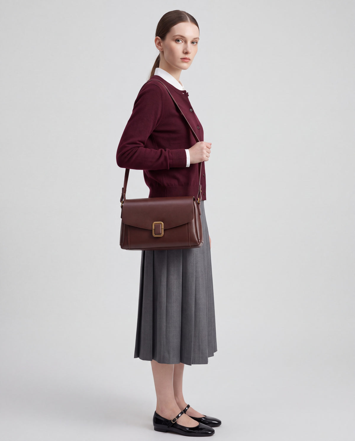 Creta bag in Mahogany – worn by model, close-up