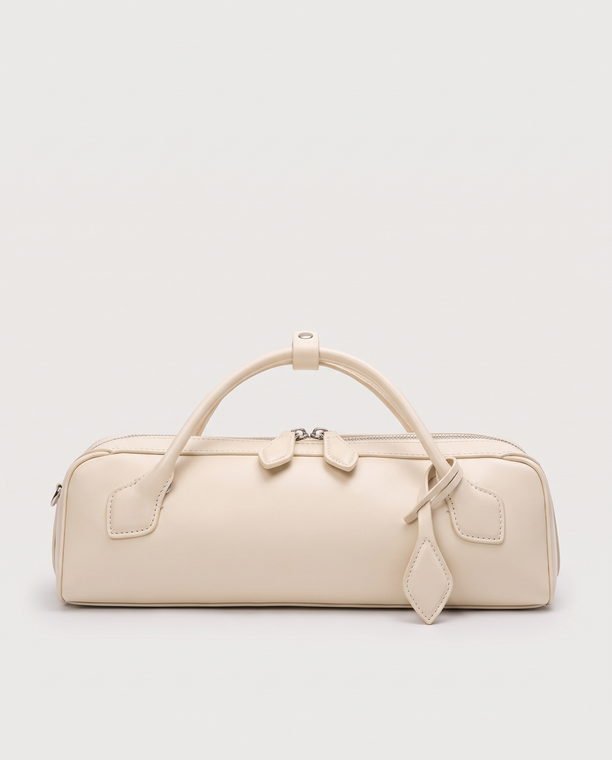 Curve leather barrel bag in Ivory – front view