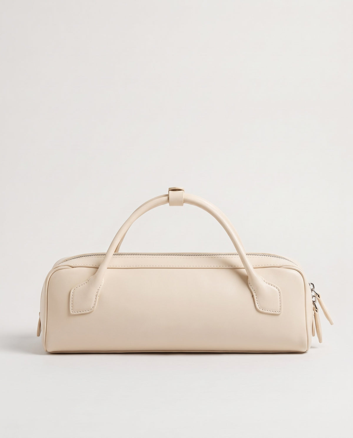 Curve leather barrel bag in Ivory – back view