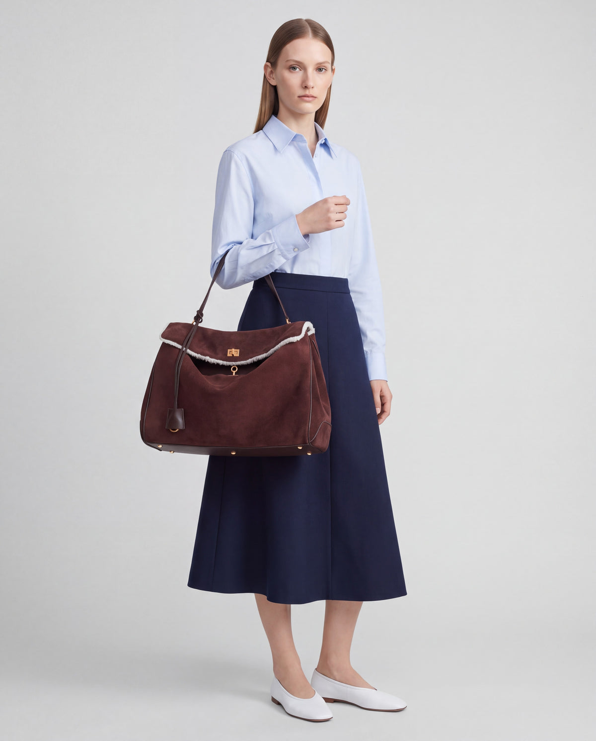 Dolce Small bag in Mahogany – worn by model, close-up