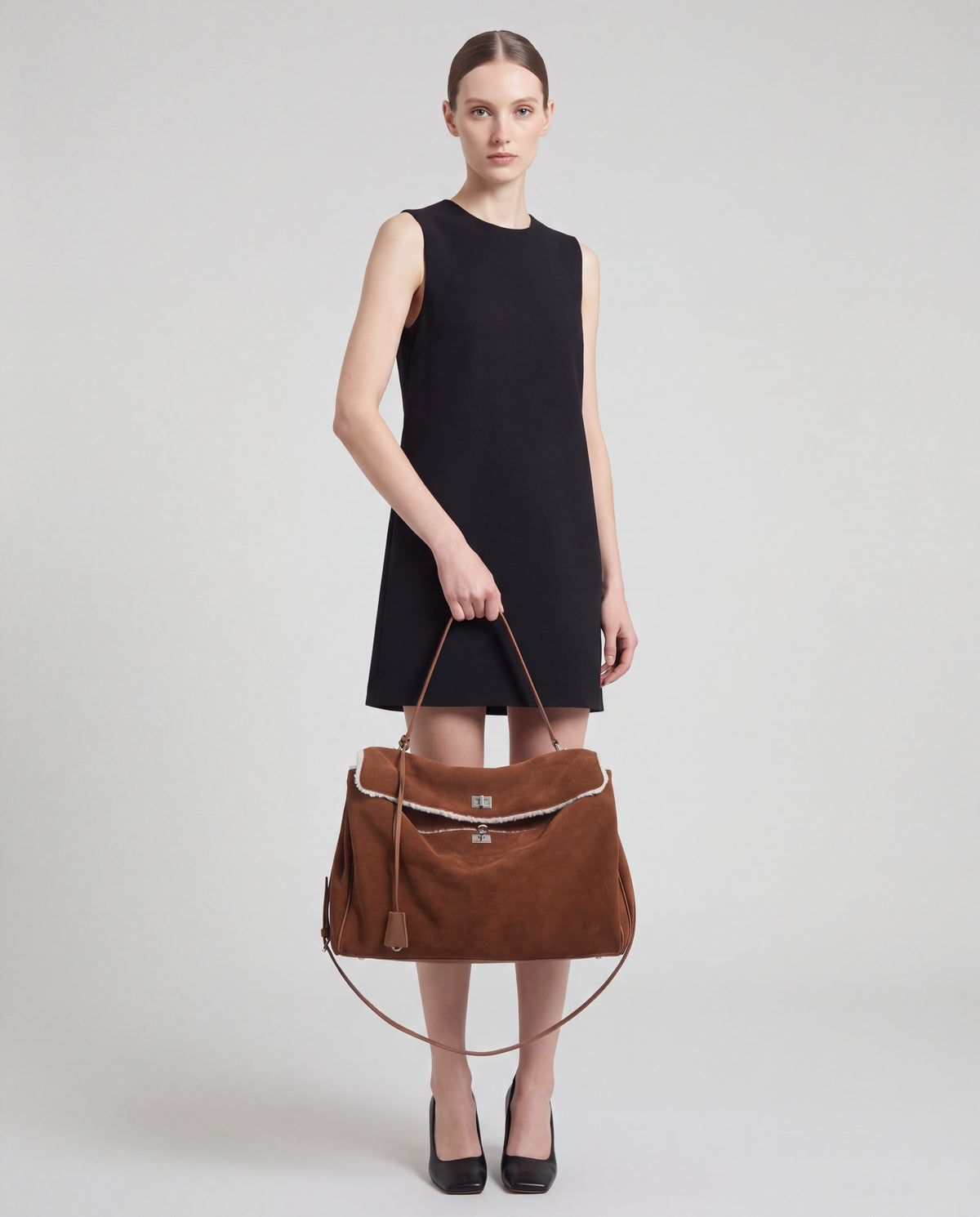 Dolce Medium bag in Brown – worn by model, close-up