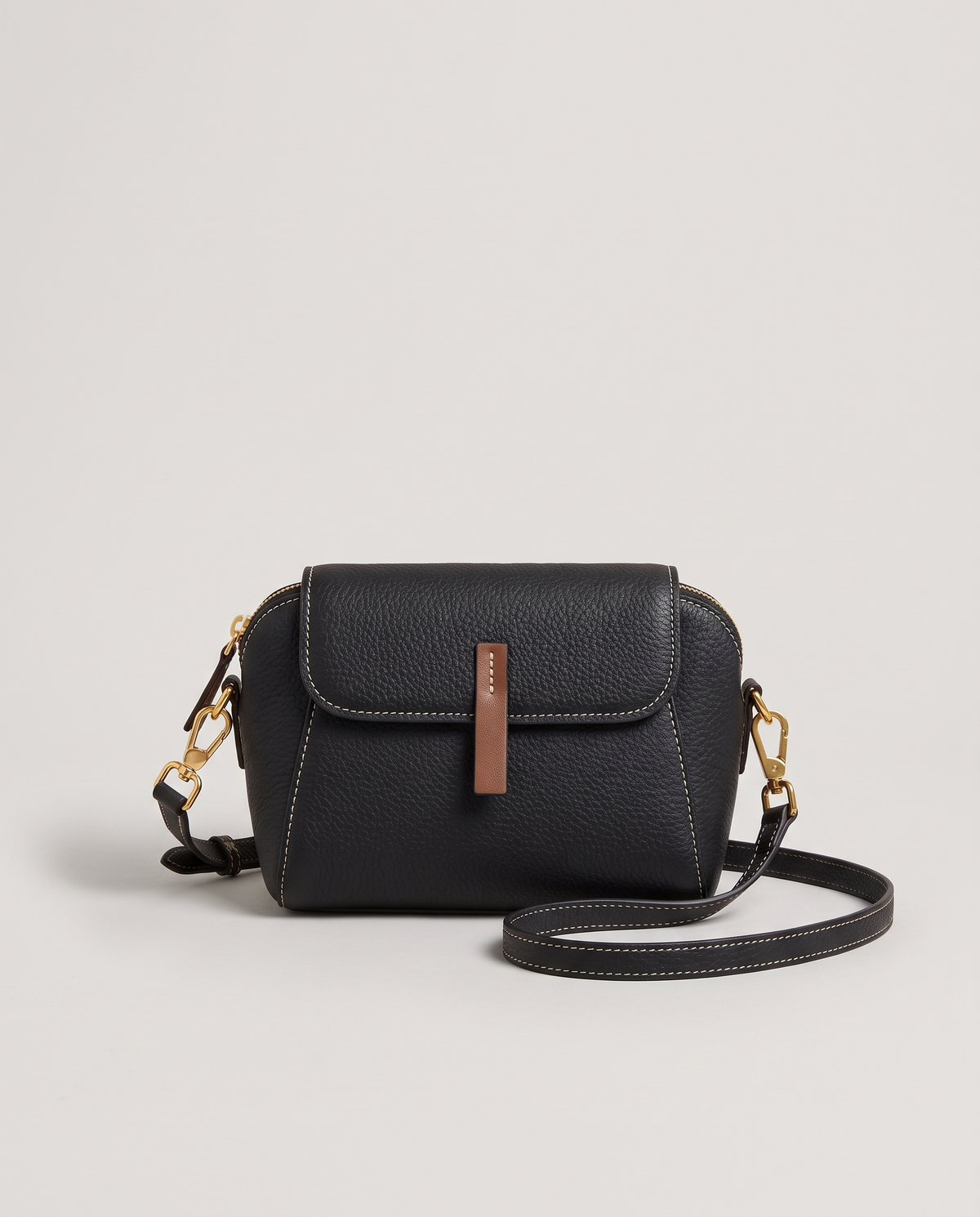 Elara mini leather crossbody in Black – front view