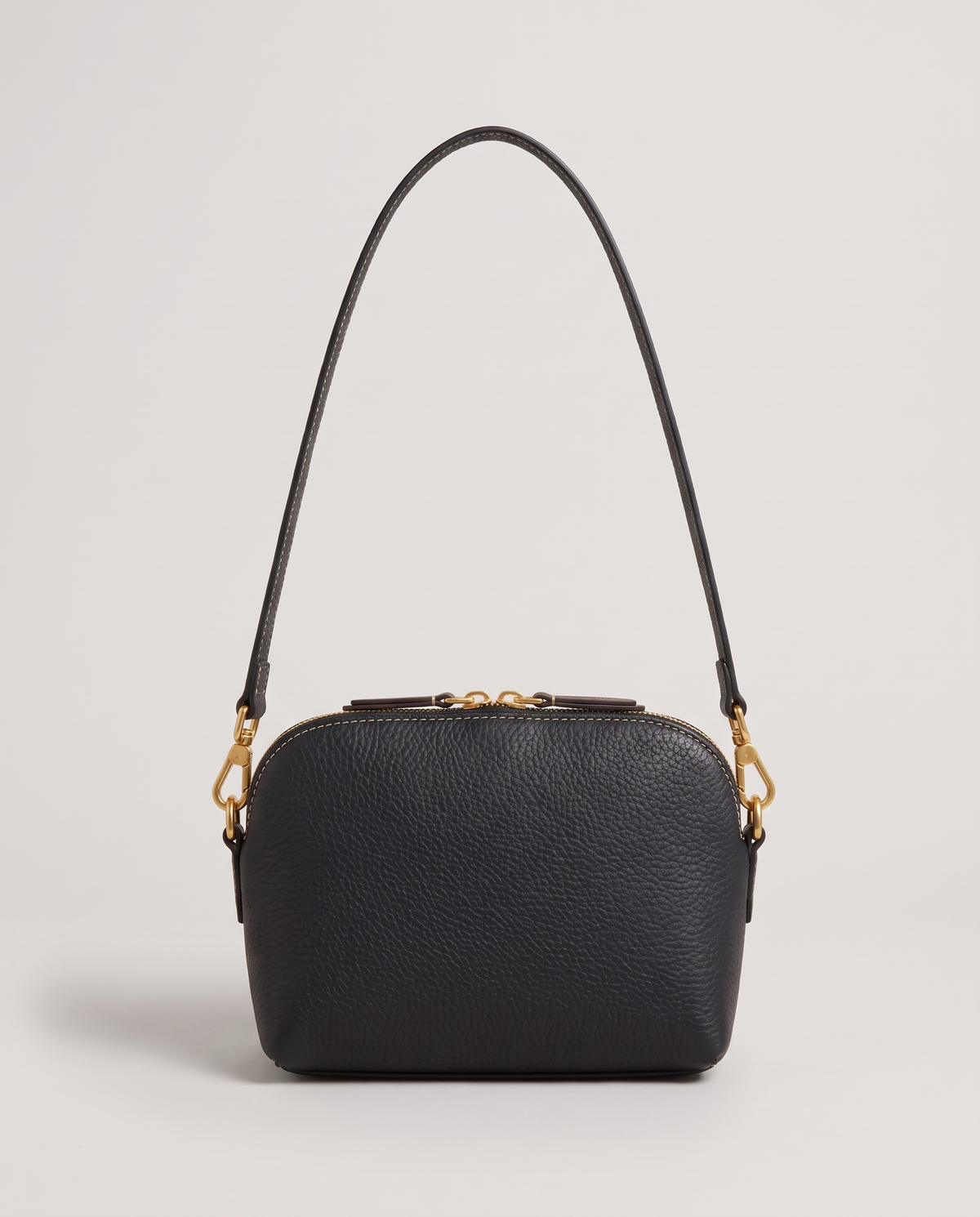 Elara mini leather crossbody in Black – back view