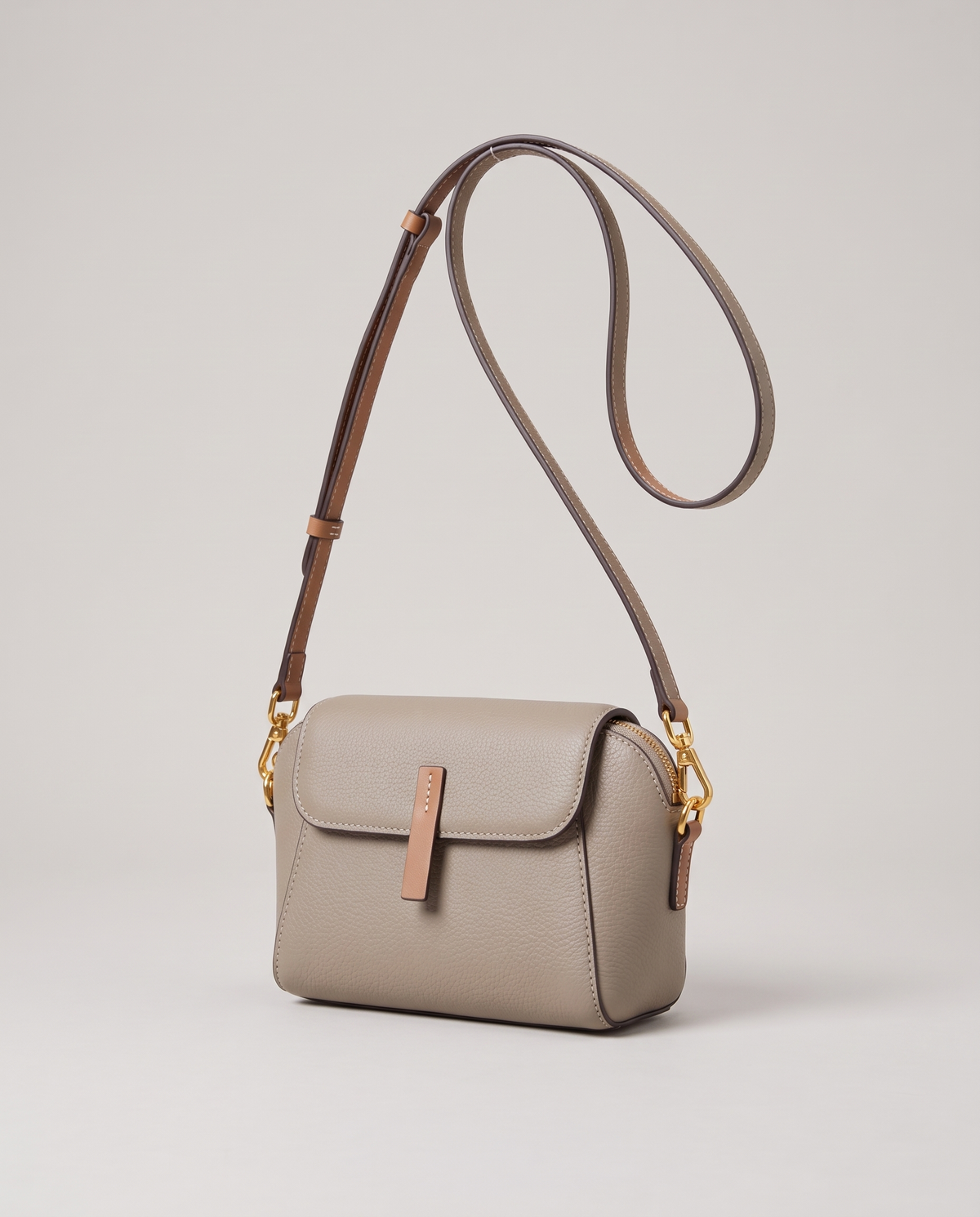 Elara mini leather crossbody in Grey – three-quarter view