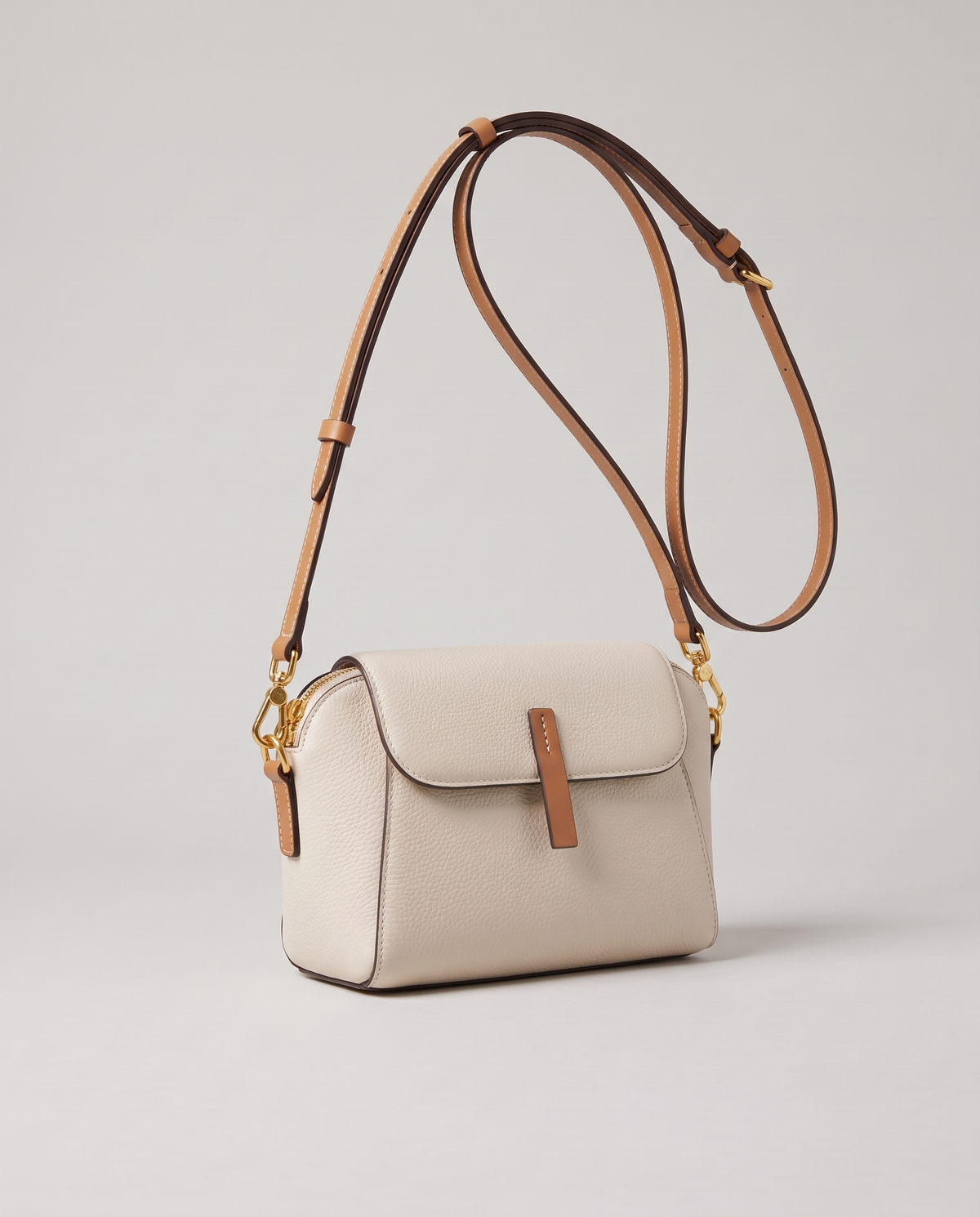 Elara mini leather crossbody in White – three-quarter view