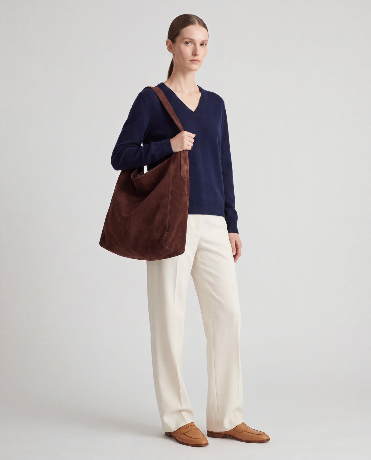 Fiato bag in Chocolate – worn by model, full length