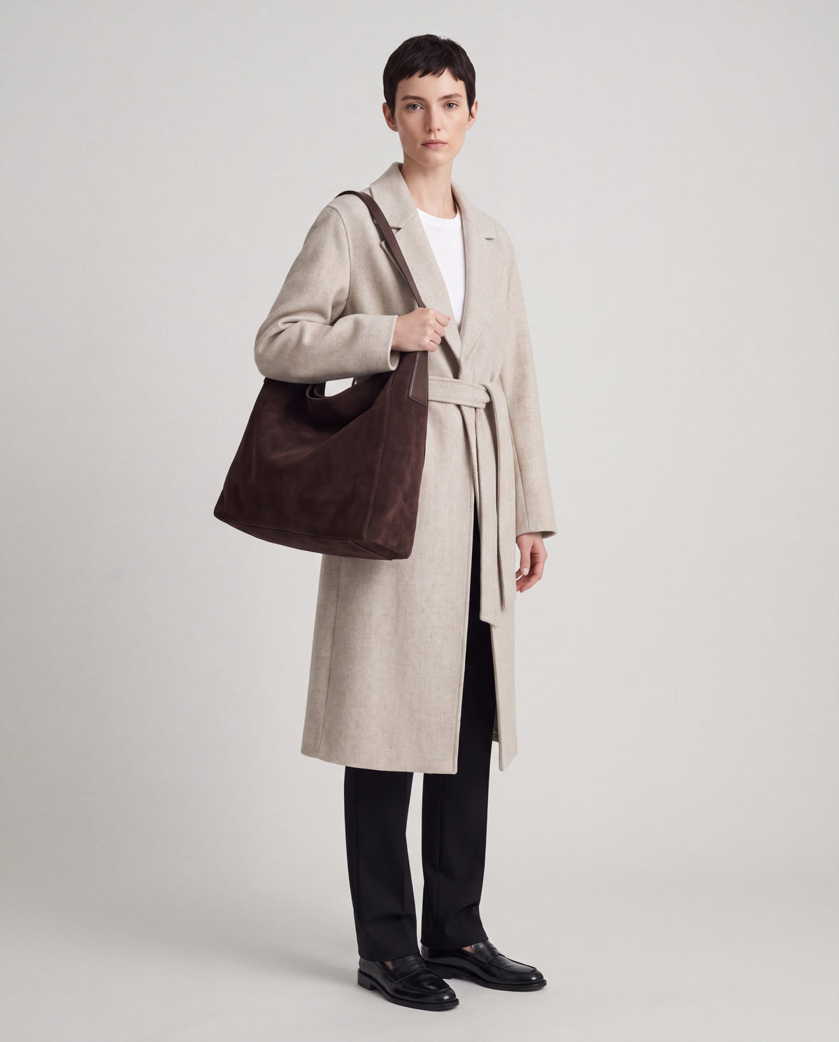 Fiato bag in Espresso – worn by model, full length