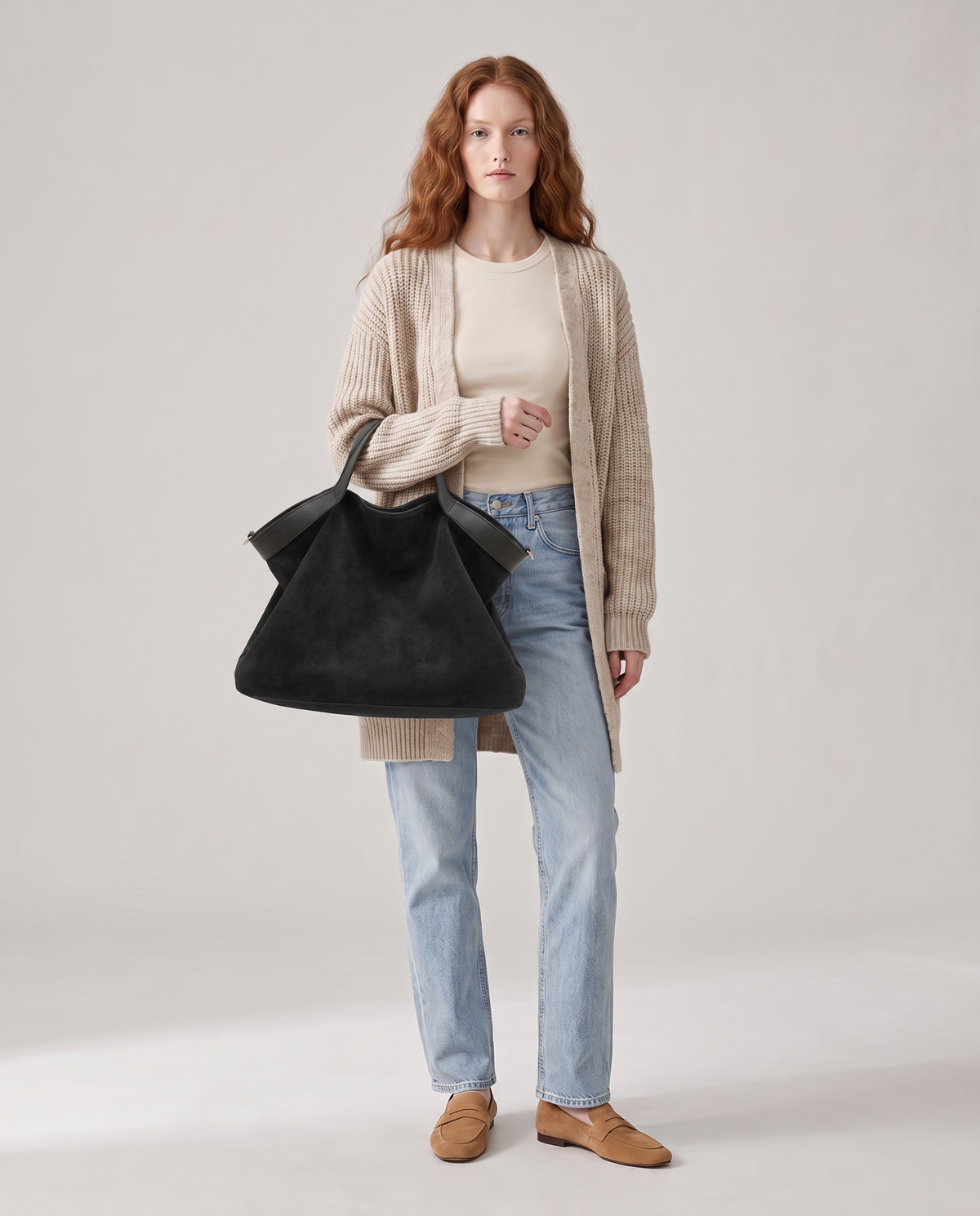Model with the Forte suede tote in black, full length