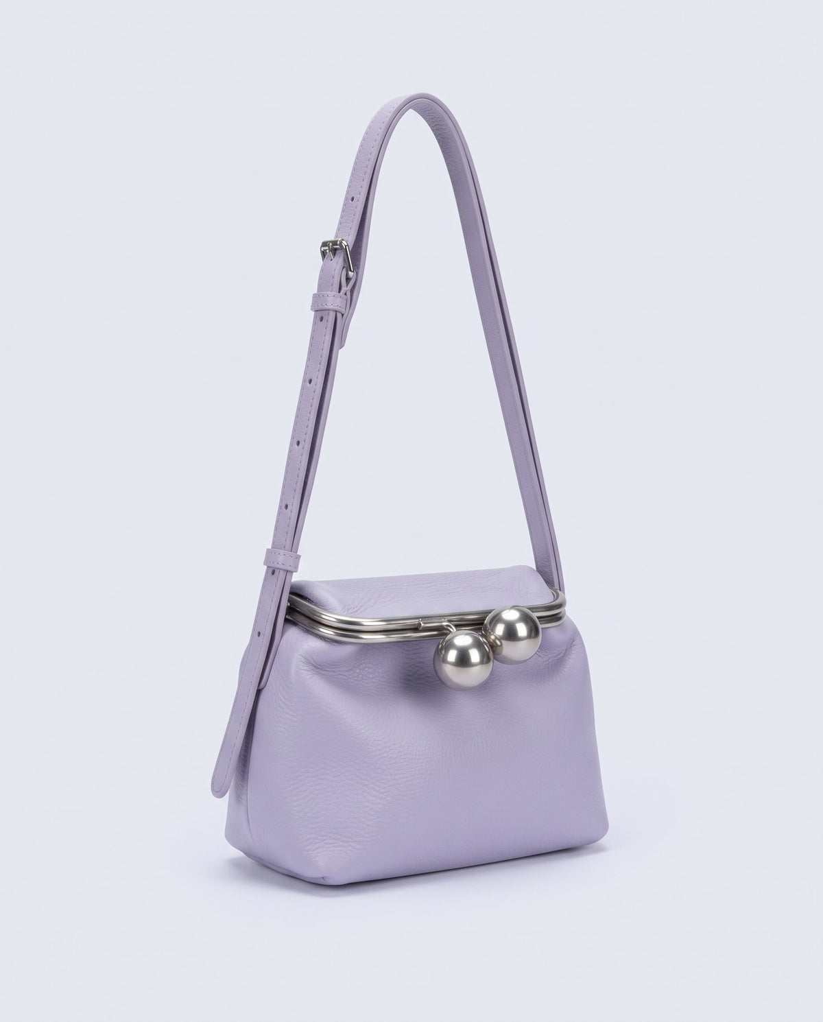 Garda leather frame bag in Lavender – three-quarter view