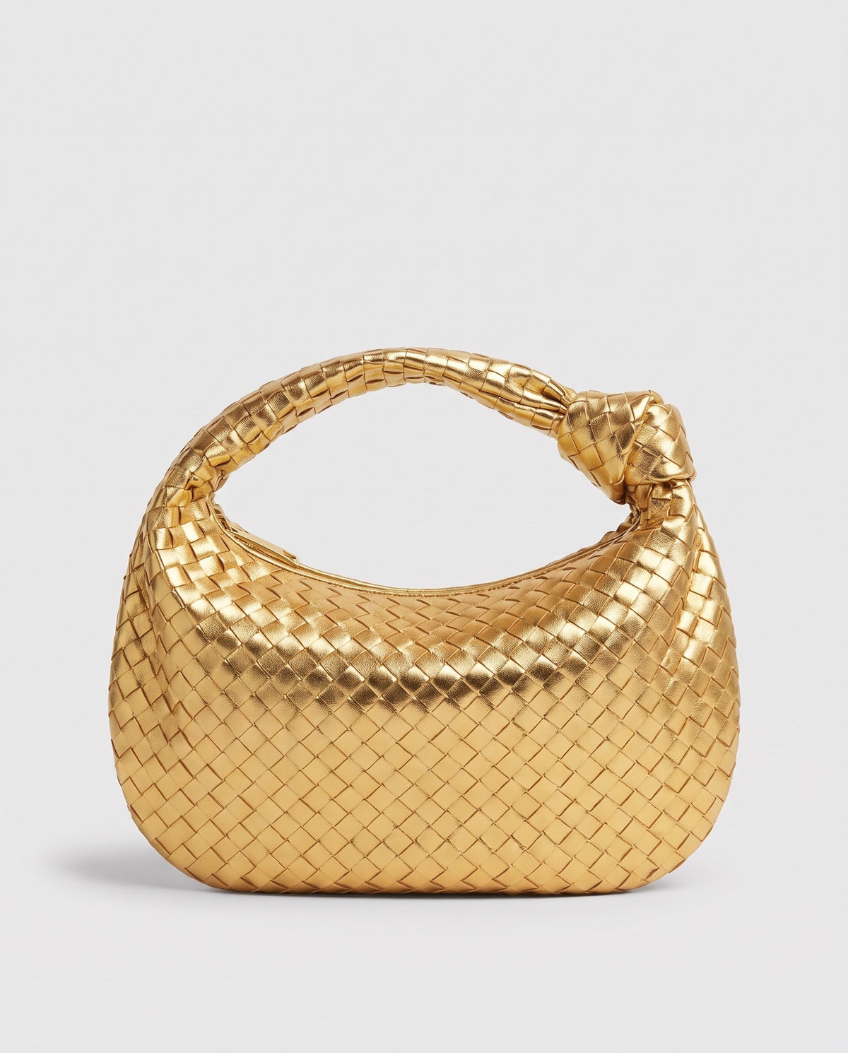 Knot Maxi woven leather shoulder bag in Gold – front view