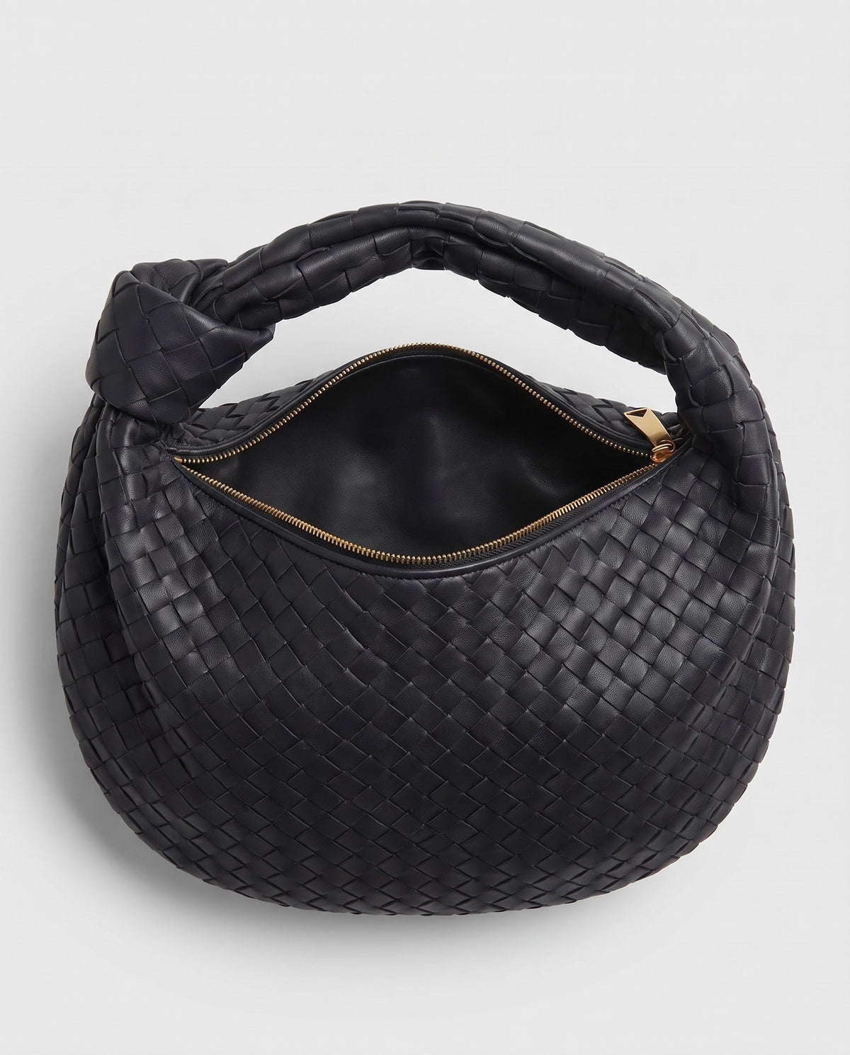 Knot Midi woven leather bag in Black – inside view with the zip open