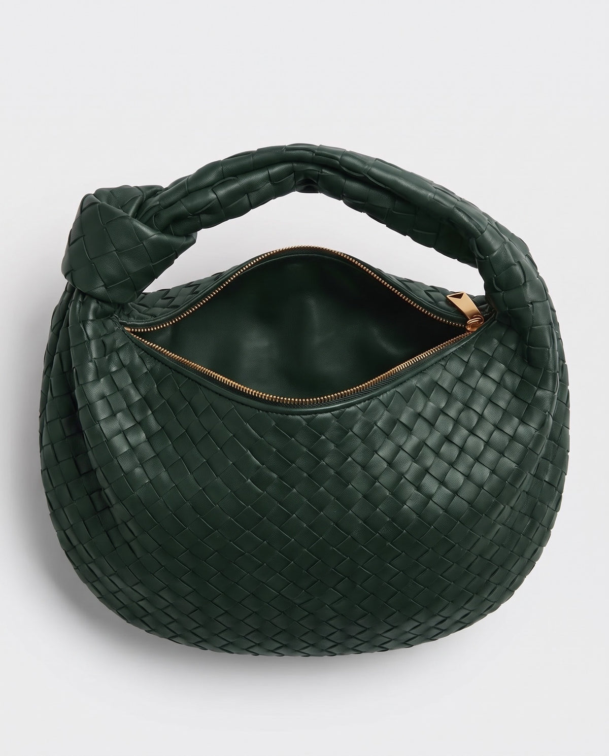 Knot Midi woven leather bag in Forest – inside view with the zip open