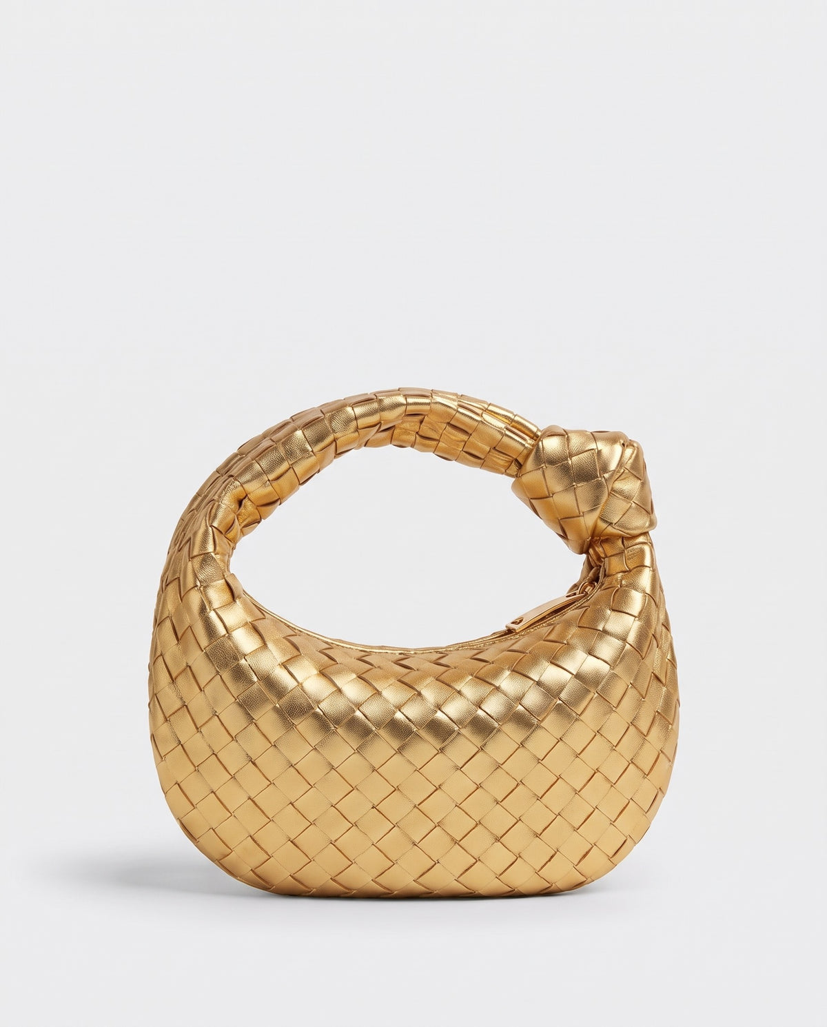 Knot Midi woven leather bag in Gold – three-quarter view