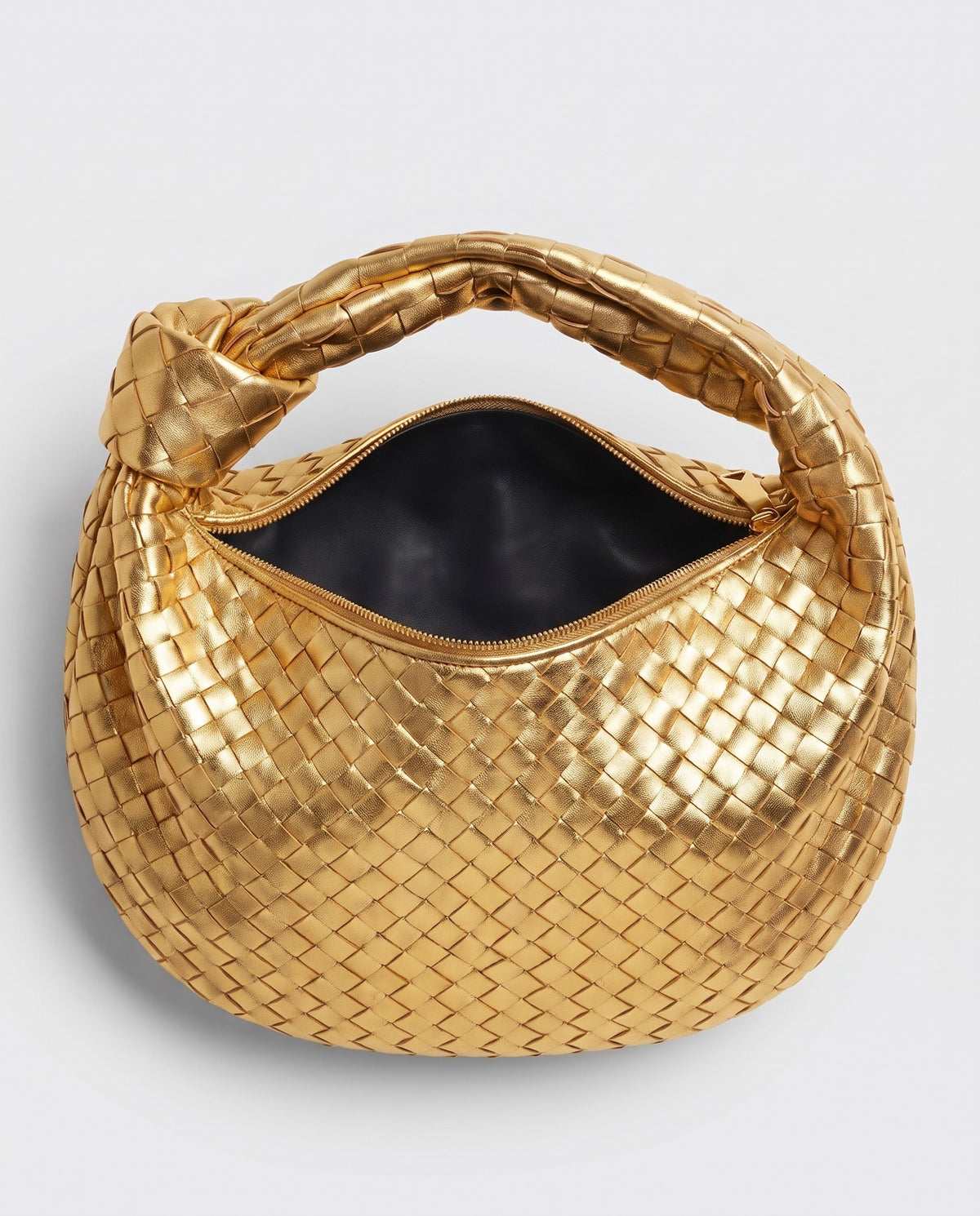 Knot Midi woven leather bag in Gold – inside view with the zip open