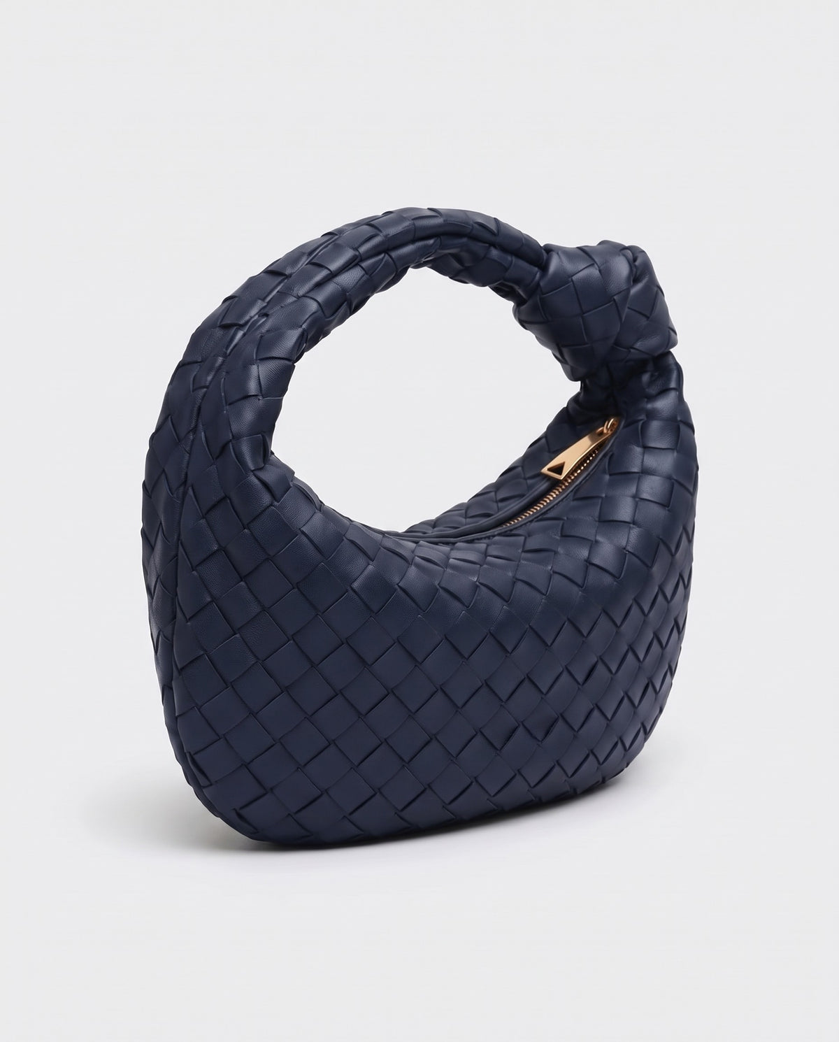 Knot Midi woven leather bag in Navy – three-quarter view