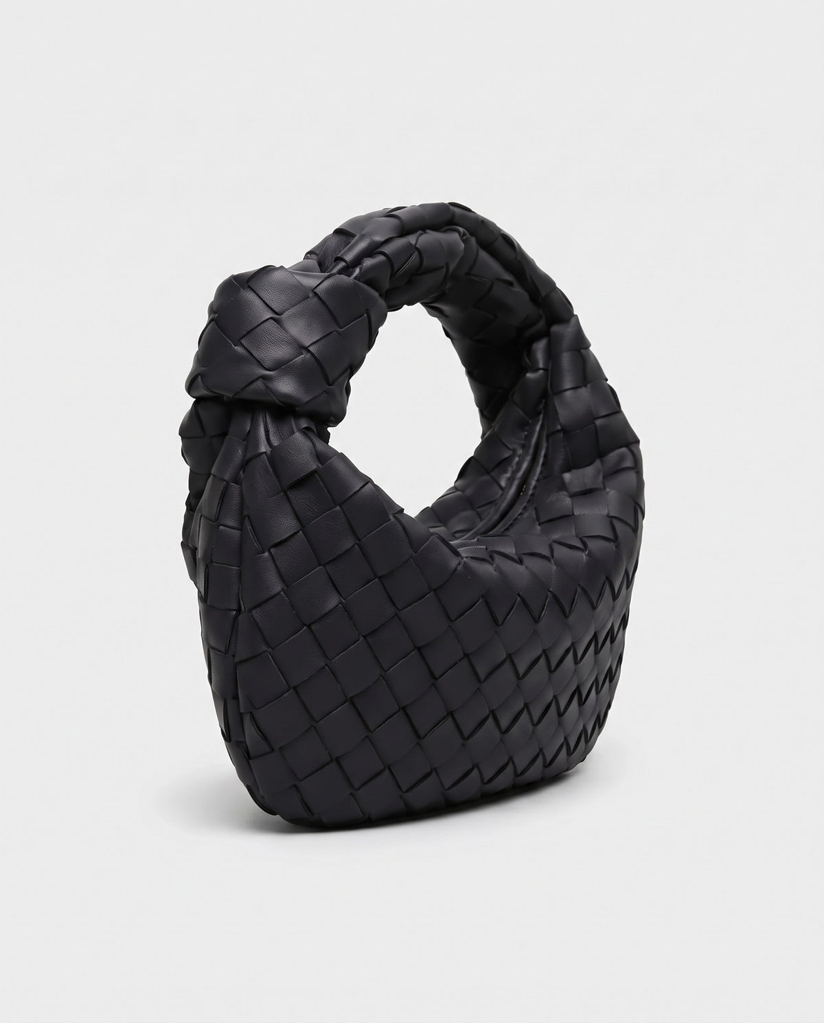 Knot Mini woven leather bag in Black – three-quarter view
