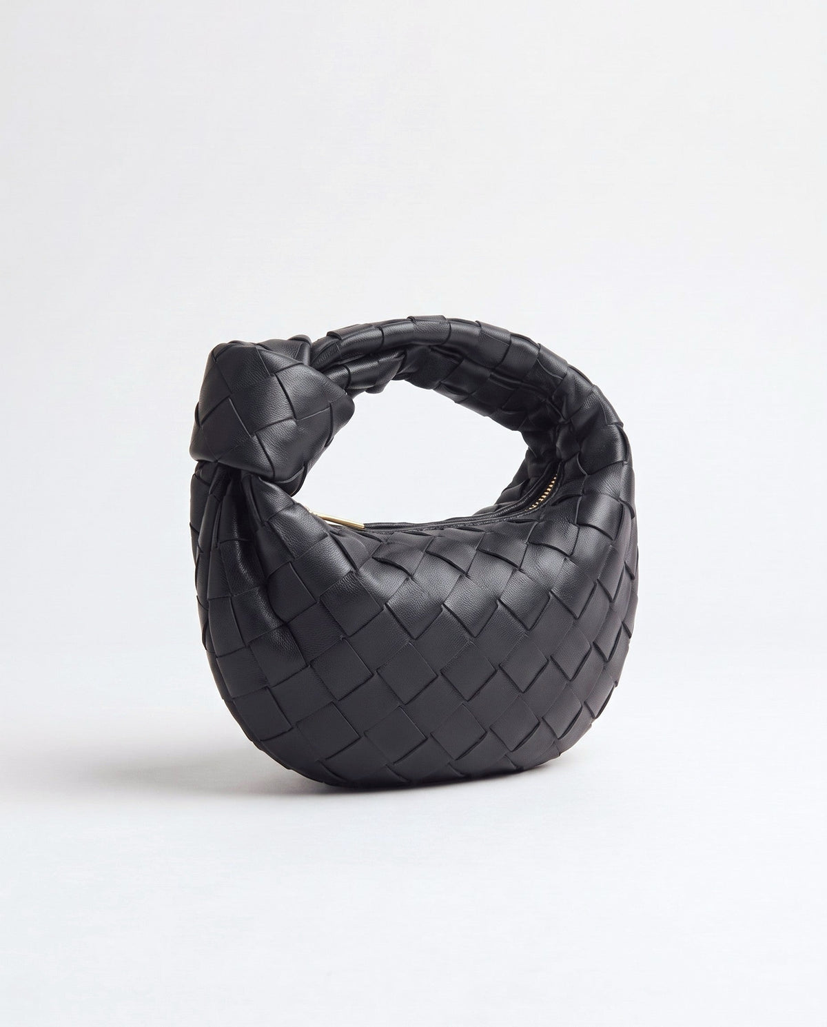 Knot Mini woven leather bag in Black – three-quarter view