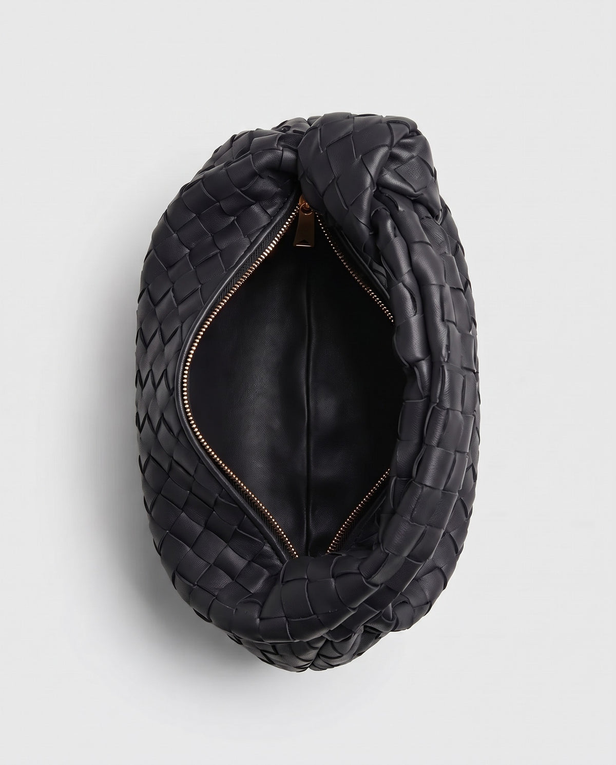 Knot Mini woven leather bag in Black – inside view with the zip open