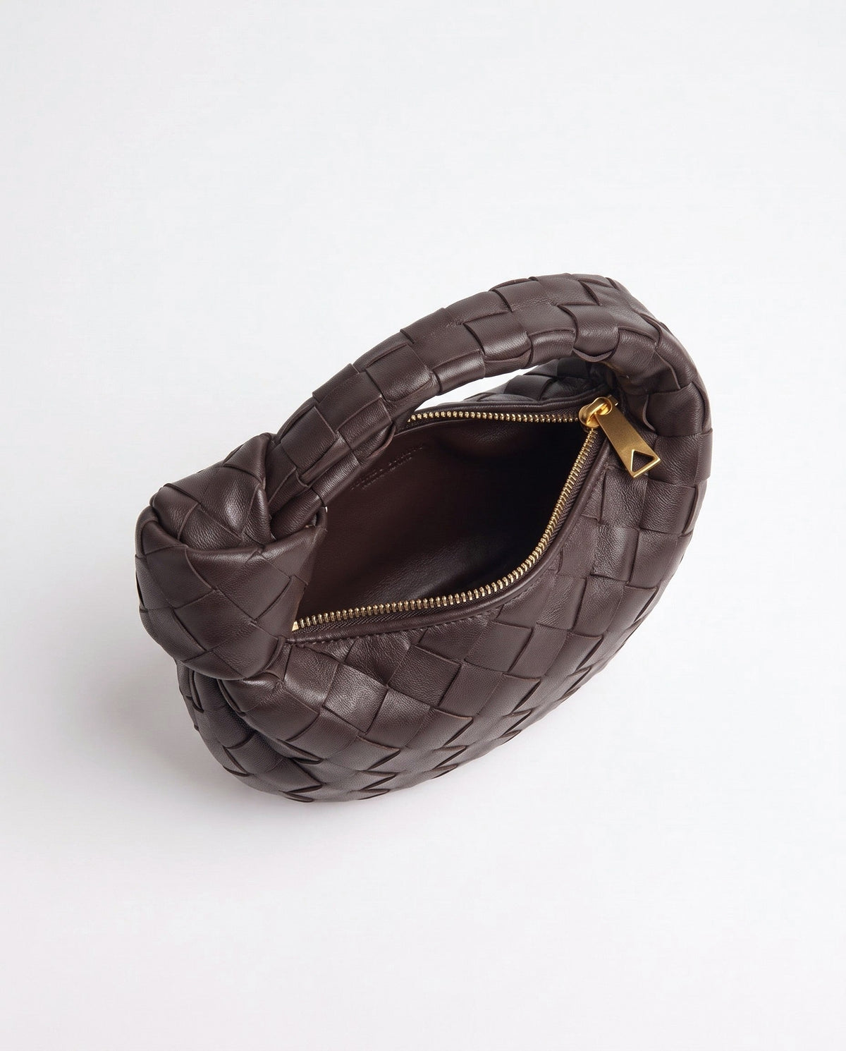 Knot Mini woven leather bag in Espresso – inside view with the zip open