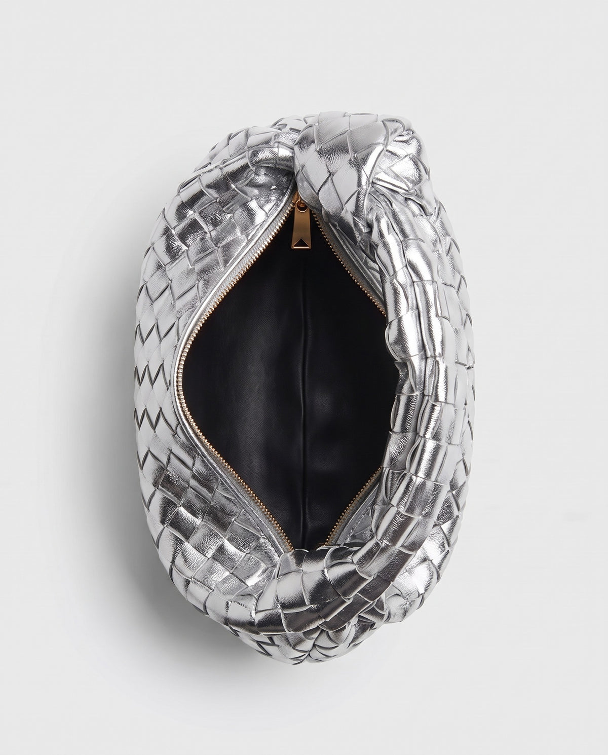 Knot Mini woven leather bag in Silver – inside view with the zip open