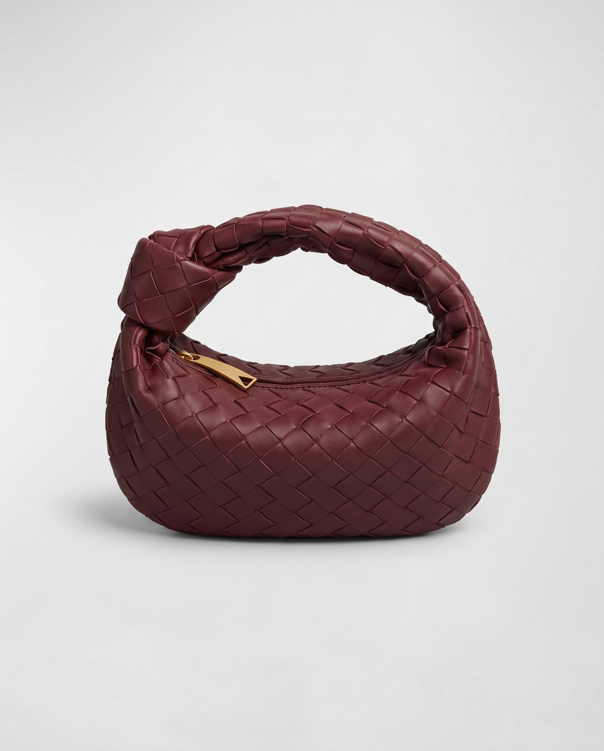 Knot Small woven leather bag in Bordeaux – front view