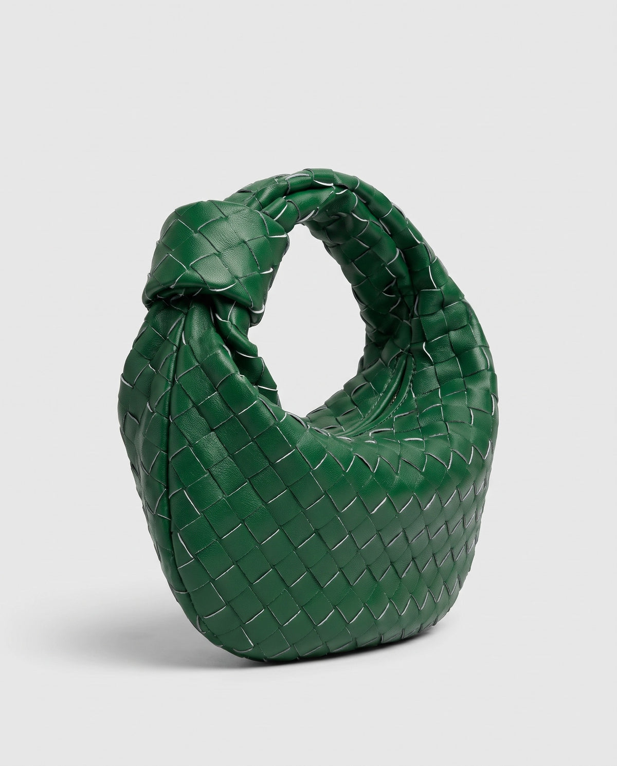 Knot Small woven leather bag in Green – three-quarter view