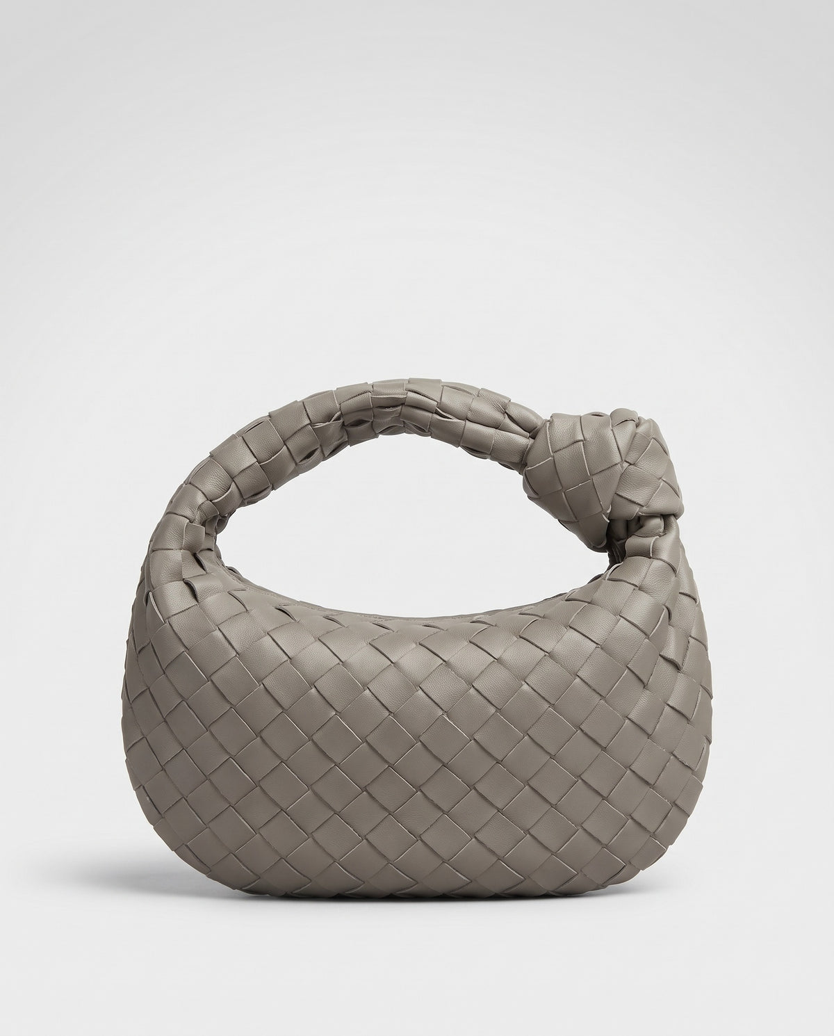 Knot Small woven leather bag in Stone – back view