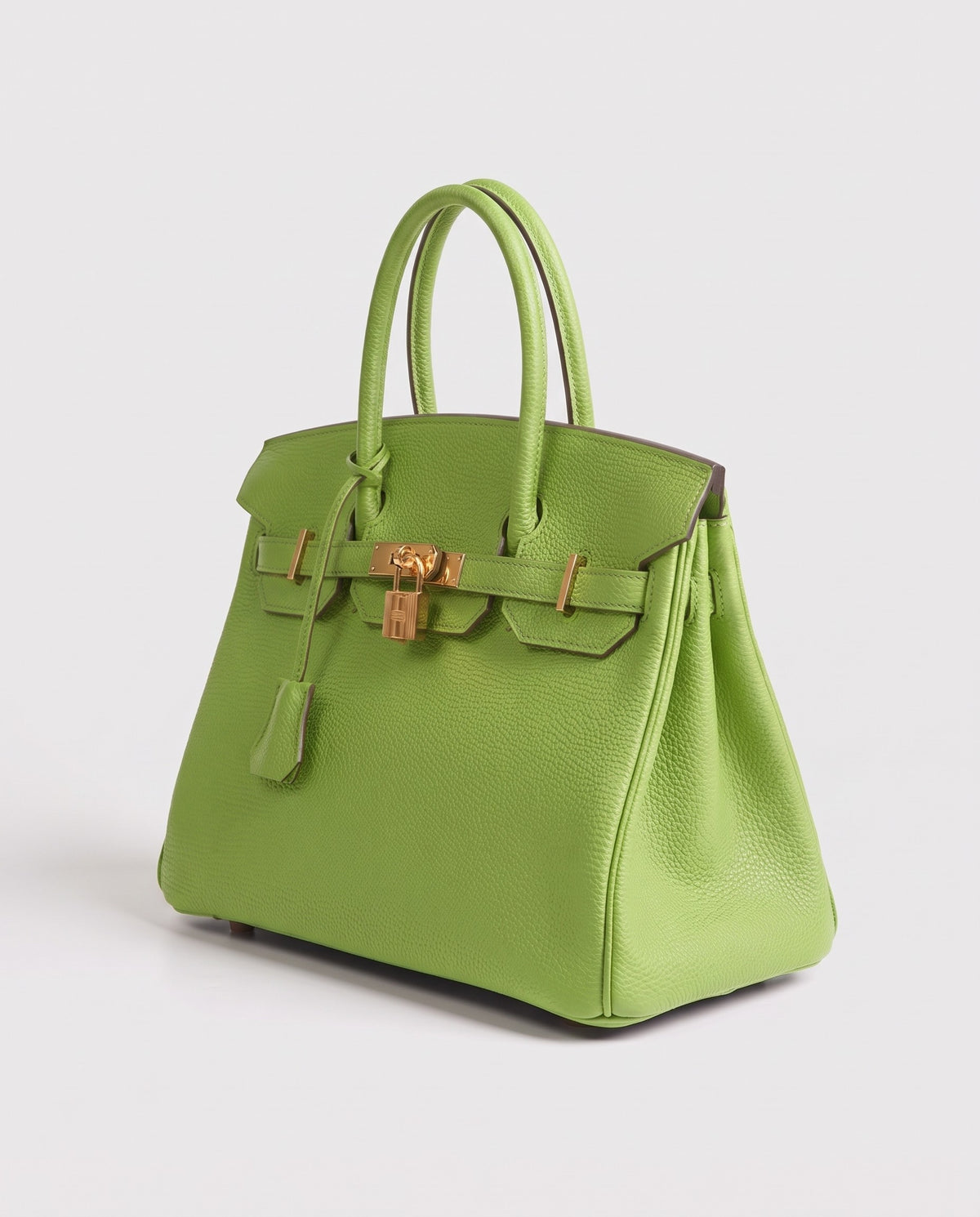 Lock Small leather top-handle bag in Avocado – three-quarter view