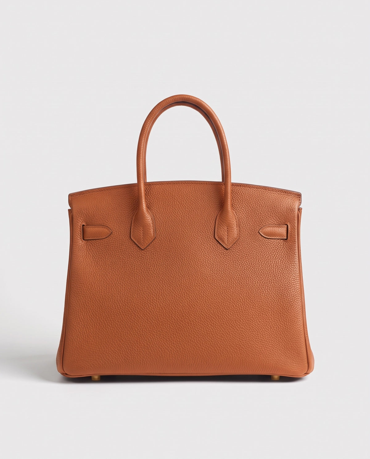 Lock Small leather top-handle bag in Caramel – back view