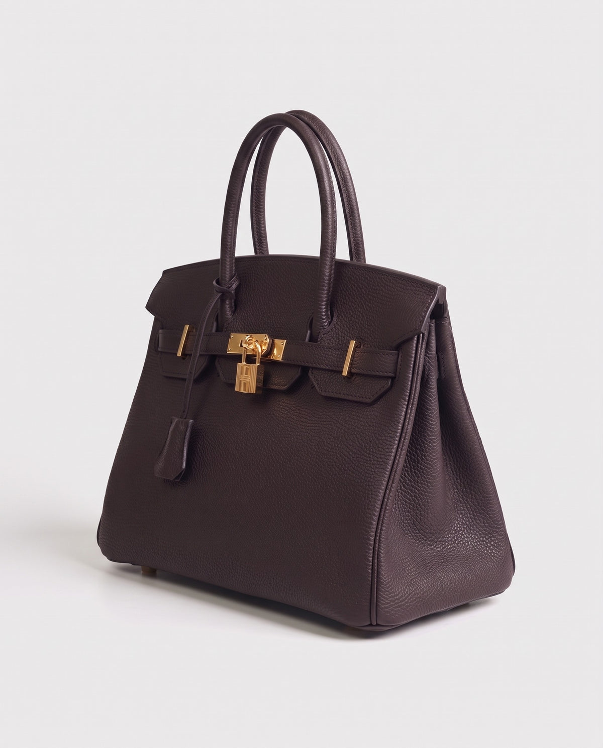 Lock Small leather top-handle bag in Espresso – three-quarter view