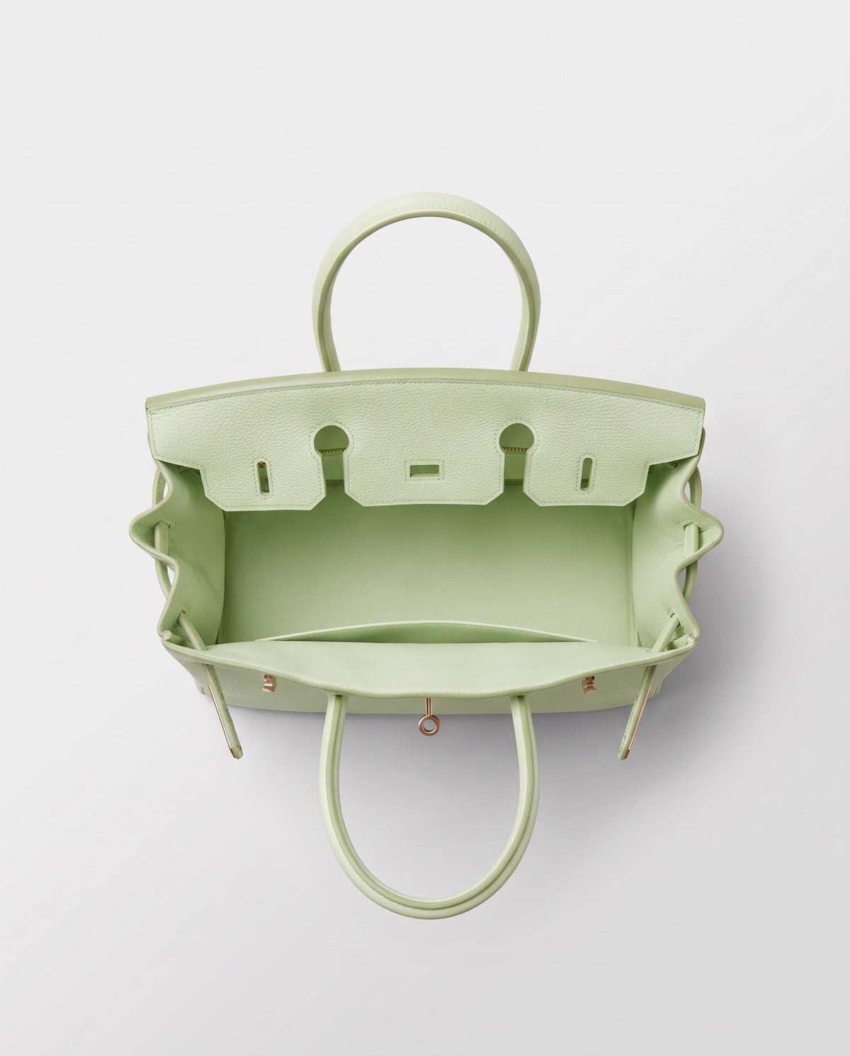 Lock Small leather top-handle bag in Mint – inside view showing the leather lining