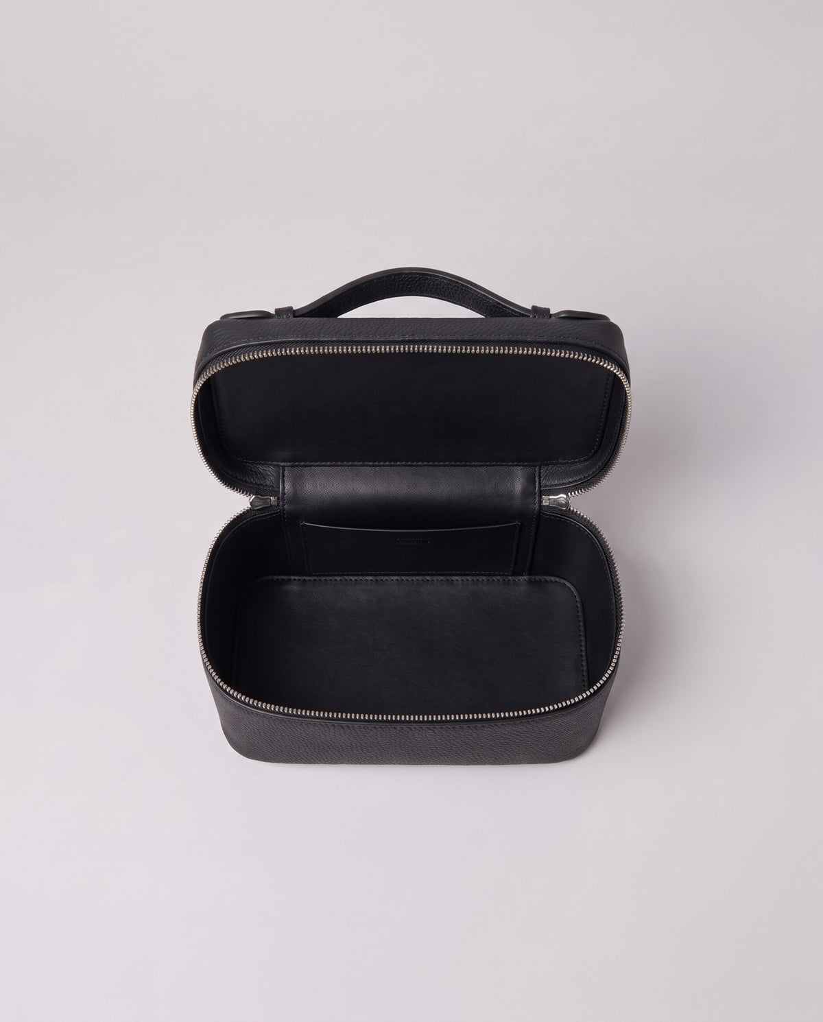 Inside the Valentina Orvieto Small top-handle bag in Black leather