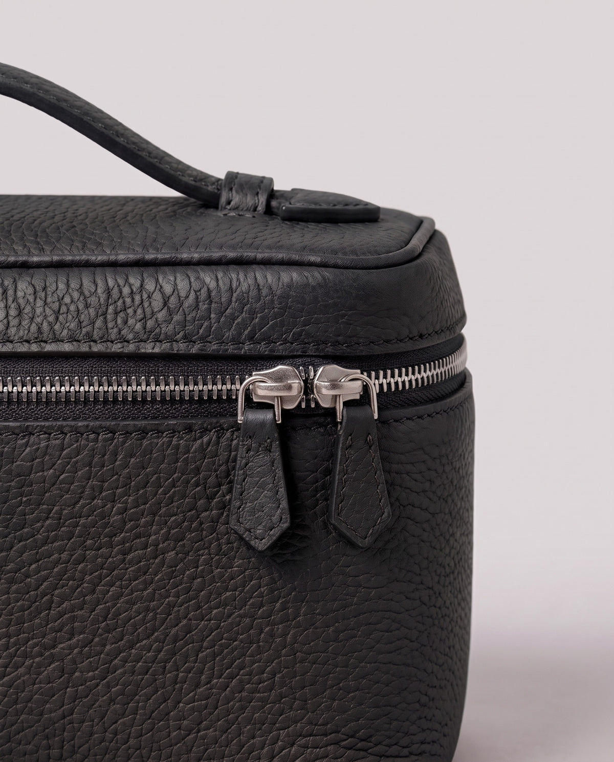 Pebbled leather close-up of the Valentina Orvieto Small bag in Black