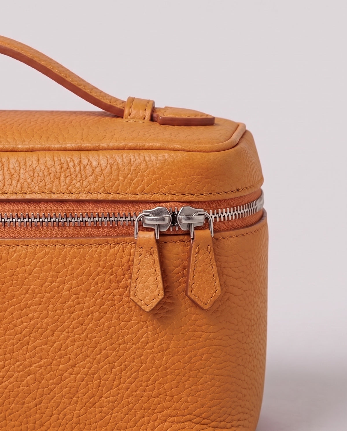 Pebbled leather close-up of the Valentina Orvieto Small bag in Camel