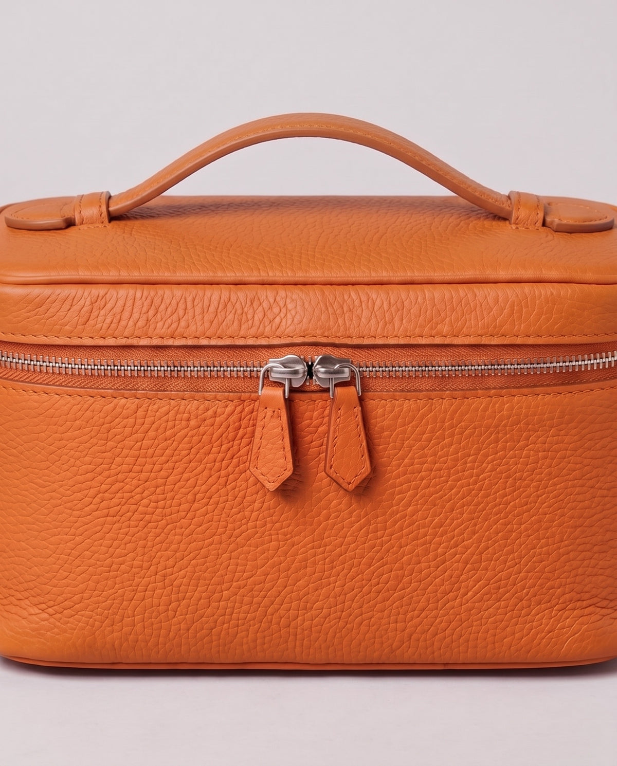 Silver zip and handle detail on the Valentina Orvieto Small bag in Cognac leather