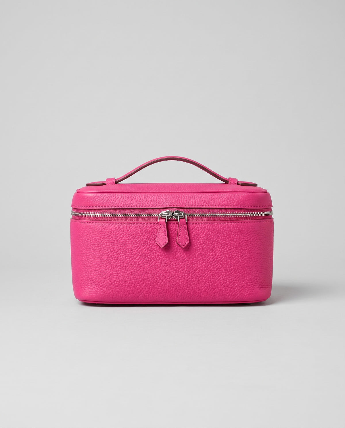 Orvieto pebbled leather vanity case in Fuchsia – front view