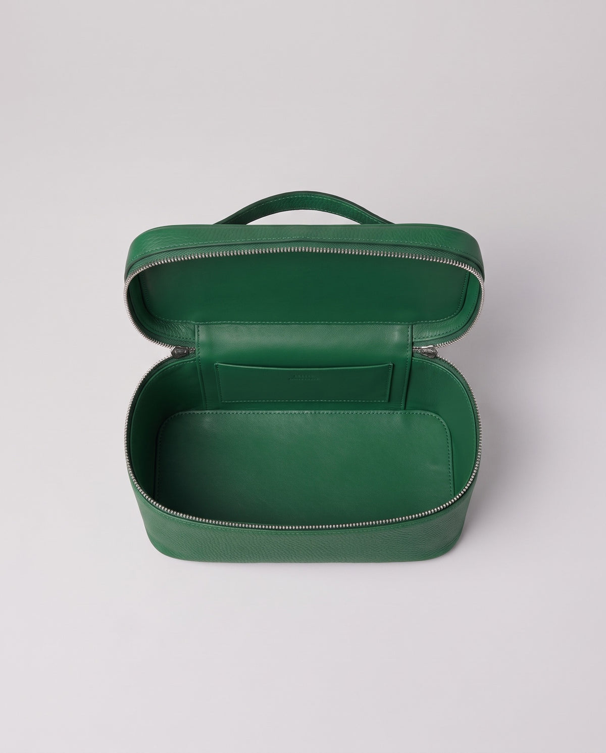Inside view of the Orvieto vanity case in Green