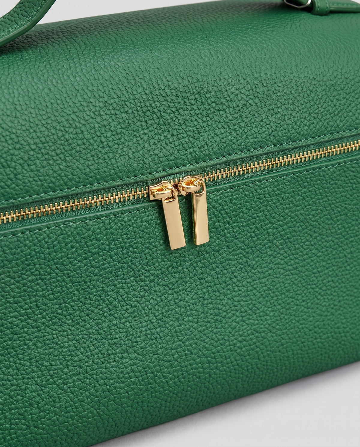 Close-up of the pebbled cowhide leather on the Orvieto vanity case in Green