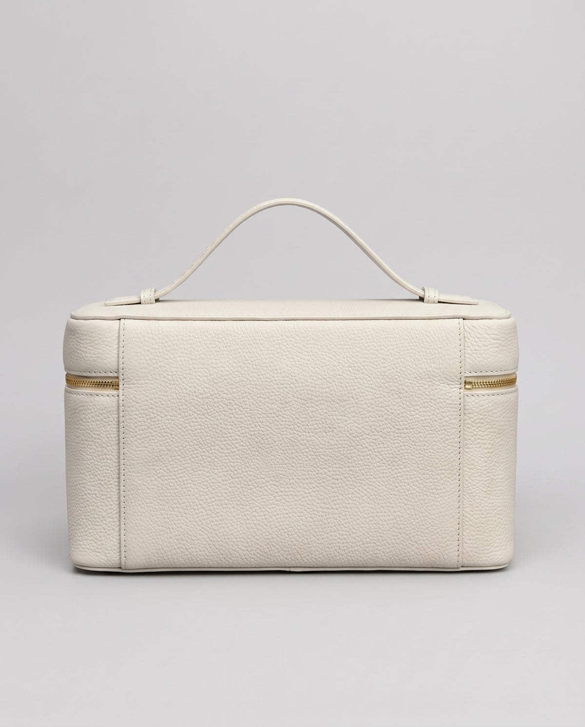 Orvieto pebbled leather vanity case in Ivory – back view